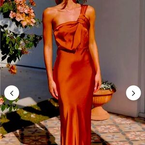 Long satin dress never worn size M. Fits like a small.